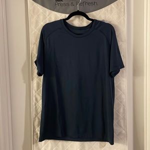 Lululemon metal vent shirt in Navy. Like new worn only a few times